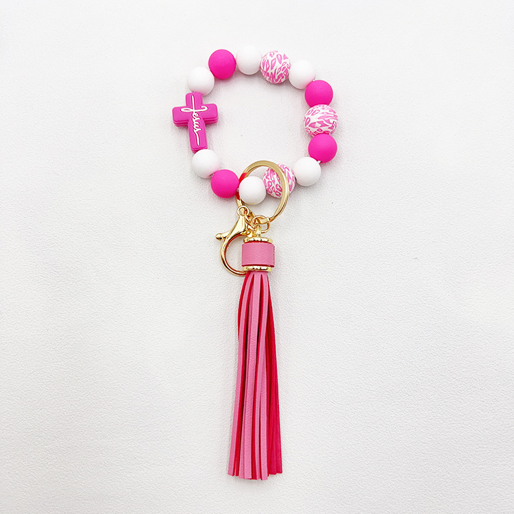 Piiriülene kuum rist silikoonist helmestega kadumisvastane käevõru leopardhelmestega PU tutiga käevõru võtmehoidja