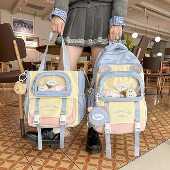 Jauna multfilmu stila bērnu mugursoma, maza, svaiga, jauka, lielas ietilpības skolēnu plecu soma, kas paredzēta došanās uz nodarbībām un skolēnu somu