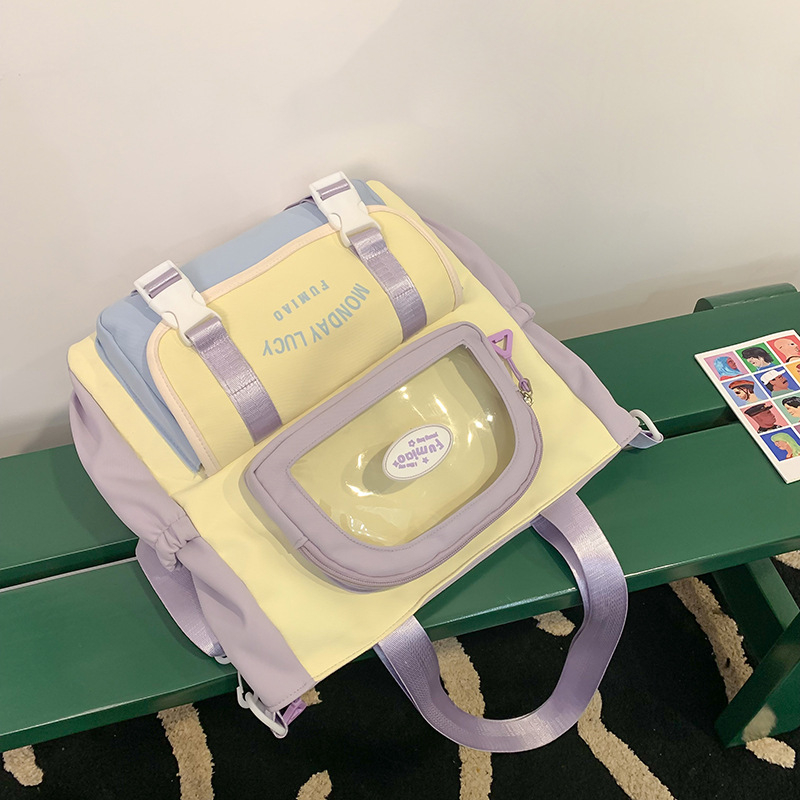 Jauna multfilmu stila bērnu mugursoma, maza, svaiga, jauka, lielas ietilpības skolēnu plecu soma, kas paredzēta došanās uz nodarbībām un skolēnu somu