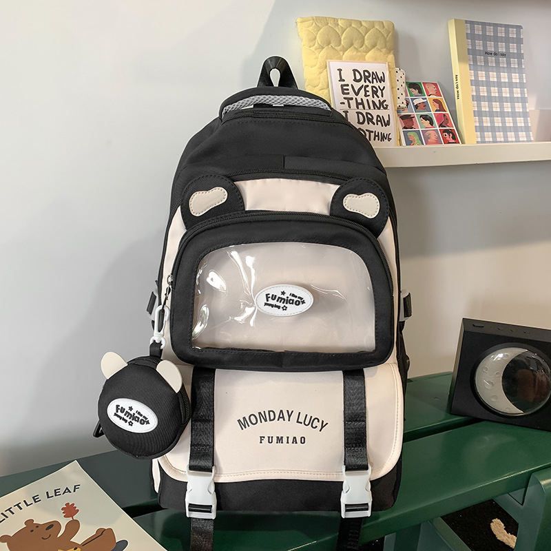 Jauna multfilmu stila bērnu mugursoma, maza, svaiga, jauka, lielas ietilpības skolēnu plecu soma, kas paredzēta došanās uz nodarbībām un skolēnu somu
