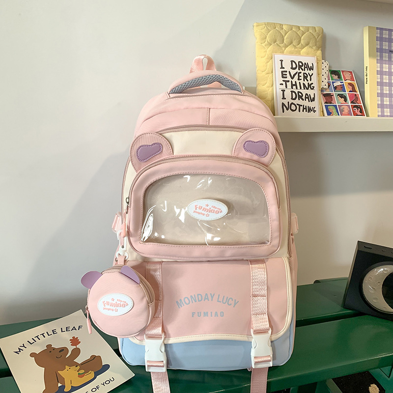 Jauna multfilmu stila bērnu mugursoma, maza, svaiga, jauka, lielas ietilpības skolēnu plecu soma, kas paredzēta došanās uz nodarbībām un skolēnu somu