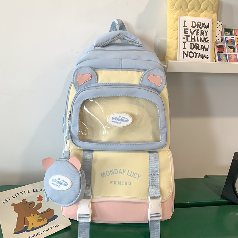 Jauna multfilmu stila bērnu mugursoma, maza, svaiga, jauka, lielas ietilpības skolēnu plecu soma, kas paredzēta došanās uz nodarbībām un skolēnu somu