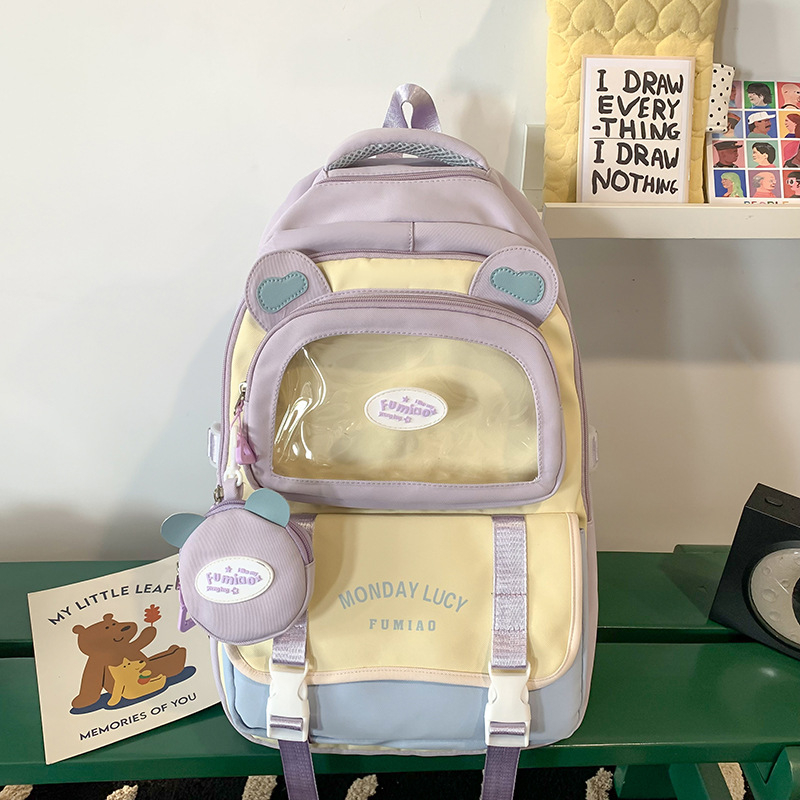 Jauna multfilmu stila bērnu mugursoma, maza, svaiga, jauka, lielas ietilpības skolēnu plecu soma, kas paredzēta došanās uz nodarbībām un skolēnu somu