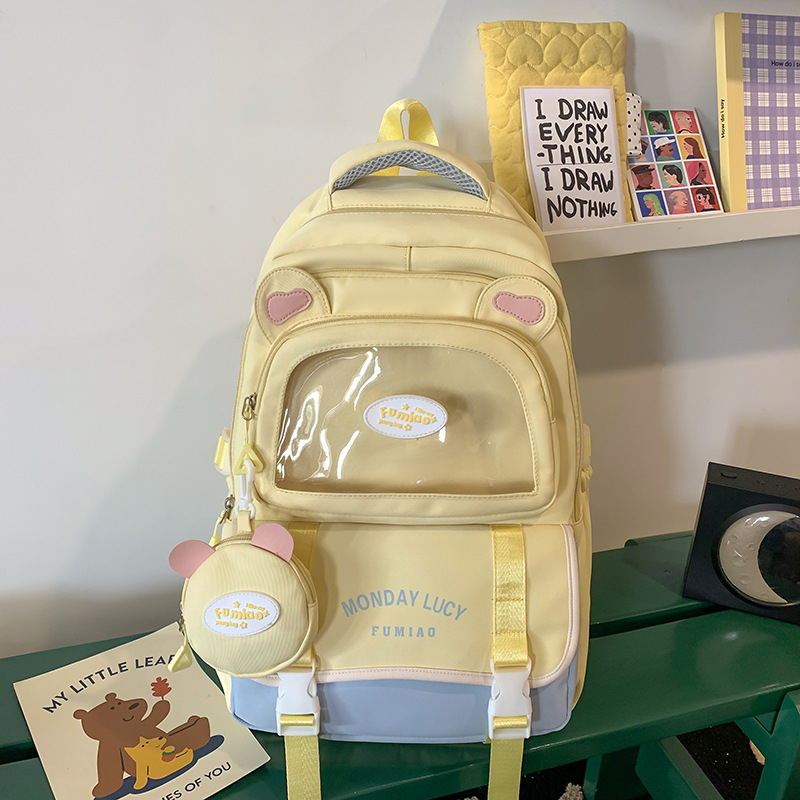 Jauna multfilmu stila bērnu mugursoma, maza, svaiga, jauka, lielas ietilpības skolēnu plecu soma, kas paredzēta došanās uz nodarbībām un skolēnu somu