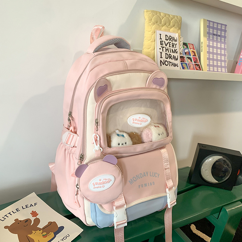 Jauna multfilmu stila bērnu mugursoma, maza, svaiga, jauka, lielas ietilpības skolēnu plecu soma, kas paredzēta došanās uz nodarbībām un skolēnu somu