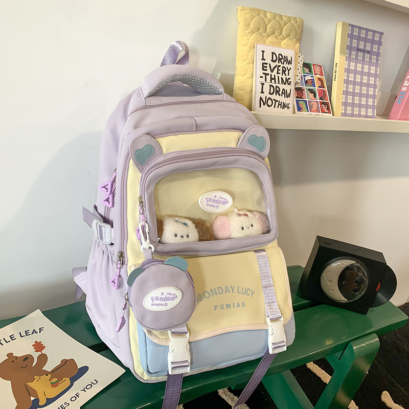 Jauna multfilmu stila bērnu mugursoma, maza, svaiga, jauka, lielas ietilpības skolēnu plecu soma, kas paredzēta došanās uz nodarbībām un skolēnu somu