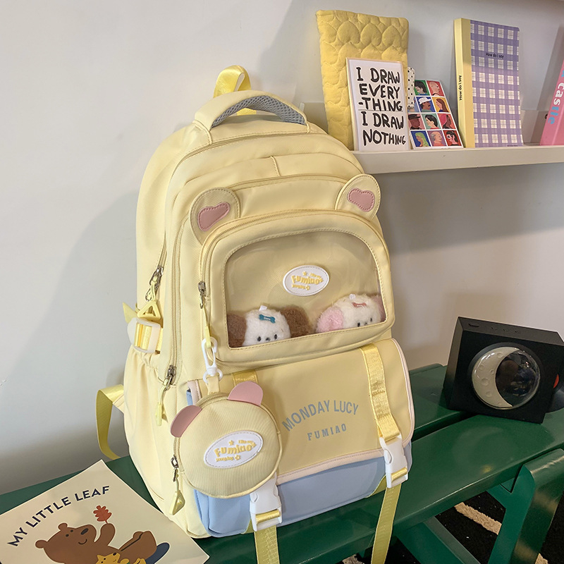 Jauna multfilmu stila bērnu mugursoma, maza, svaiga, jauka, lielas ietilpības skolēnu plecu soma, kas paredzēta došanās uz nodarbībām un skolēnu somu