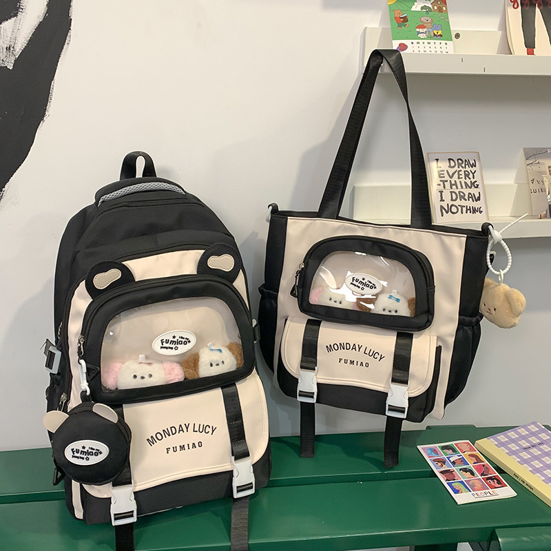 Jauna multfilmu stila bērnu mugursoma, maza, svaiga, jauka, lielas ietilpības skolēnu plecu soma, kas paredzēta došanās uz nodarbībām un skolēnu somu