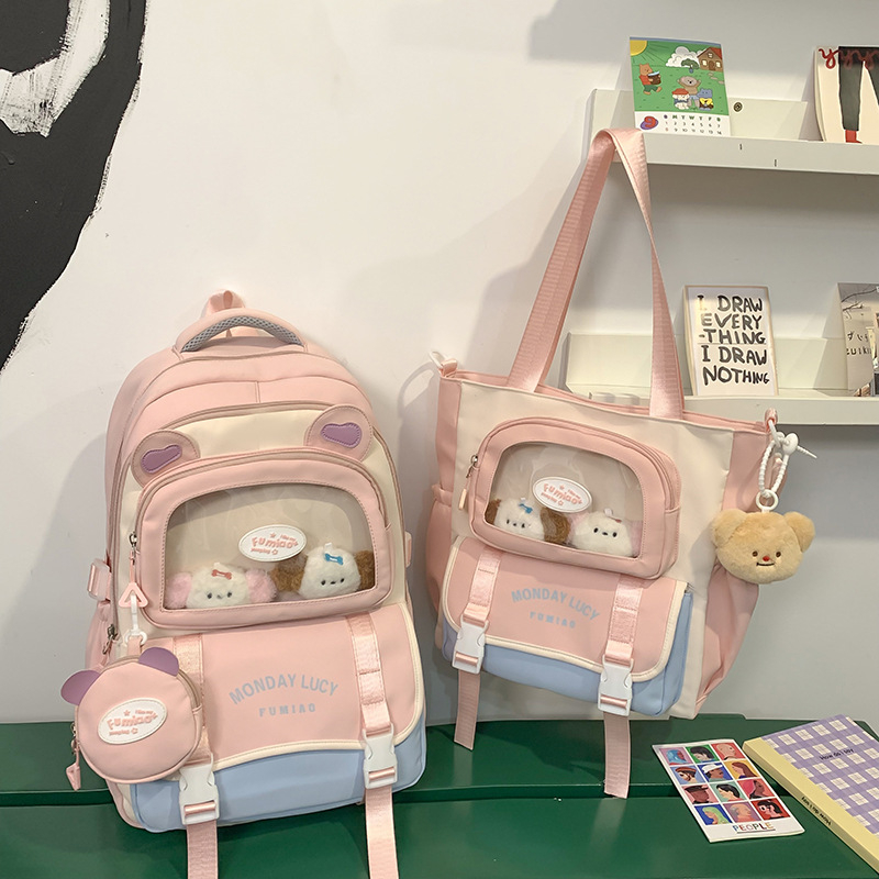Jauna multfilmu stila bērnu mugursoma, maza, svaiga, jauka, lielas ietilpības skolēnu plecu soma, kas paredzēta došanās uz nodarbībām un skolēnu somu