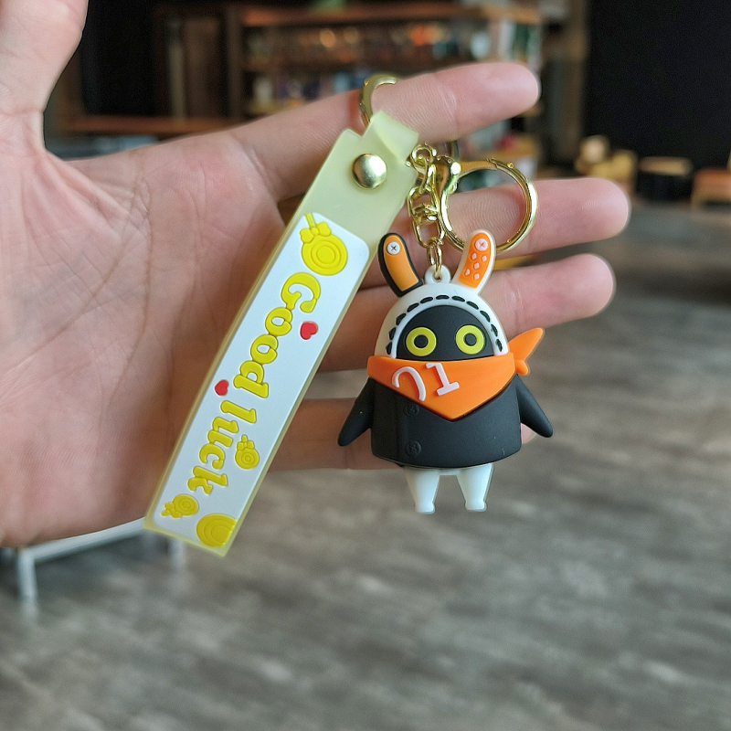 Jauna unikāla zona nulles perifērijas atslēgu piekariņš gudrs sprādziena auduma līmes lelle skolēna skolas somas kulons greifers dāvana vairumtirdzniecība