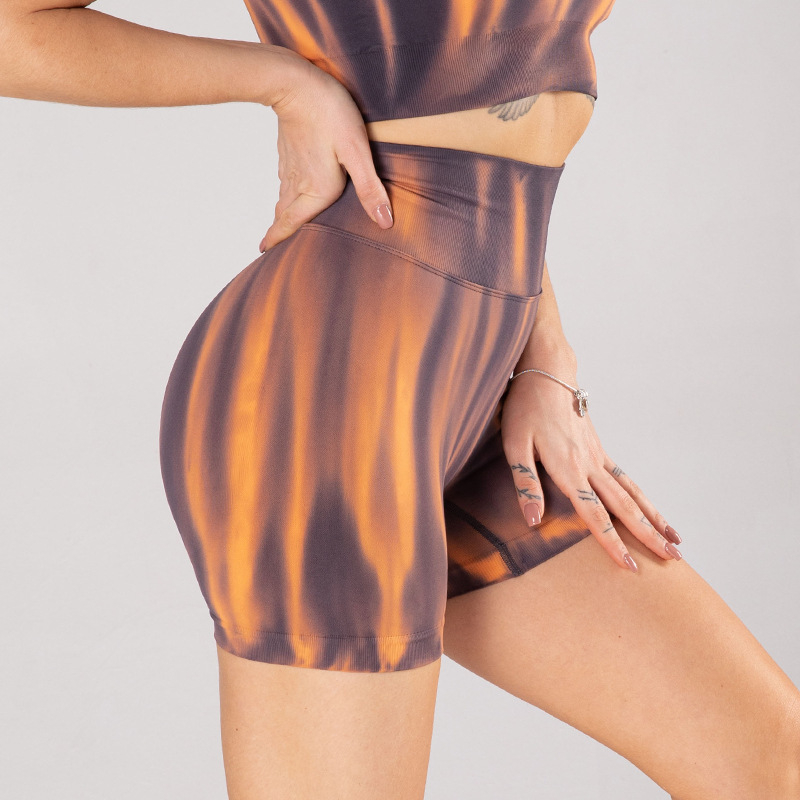 Lipsuvärvi virsikuvärvi tagumikuga naiste lühikesed püksid, Euroopa ja Ameerika Aurora erksavärvilised joogapüksid ülerõivasteks, kõrge vöökohaga tagumikku tõstvad kolmepunktilised spordipüksid