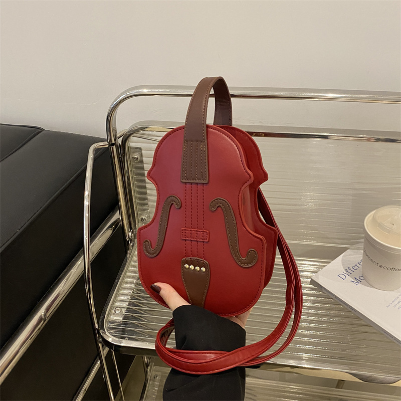 2024 Noua vioară Comerț exterior Geantă pentru femei Moda europeană și americană Stil universitar Geantă de umăr unic Crossbody Geantă Temperament Personalizată Rucsac