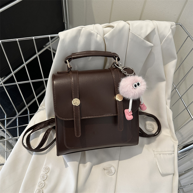 Vienkārša mugursoma sieviešu koledžas stila soma sieviešu soma 2023. gada jauna modes ikdienas plecu rokassoma maza mugursoma