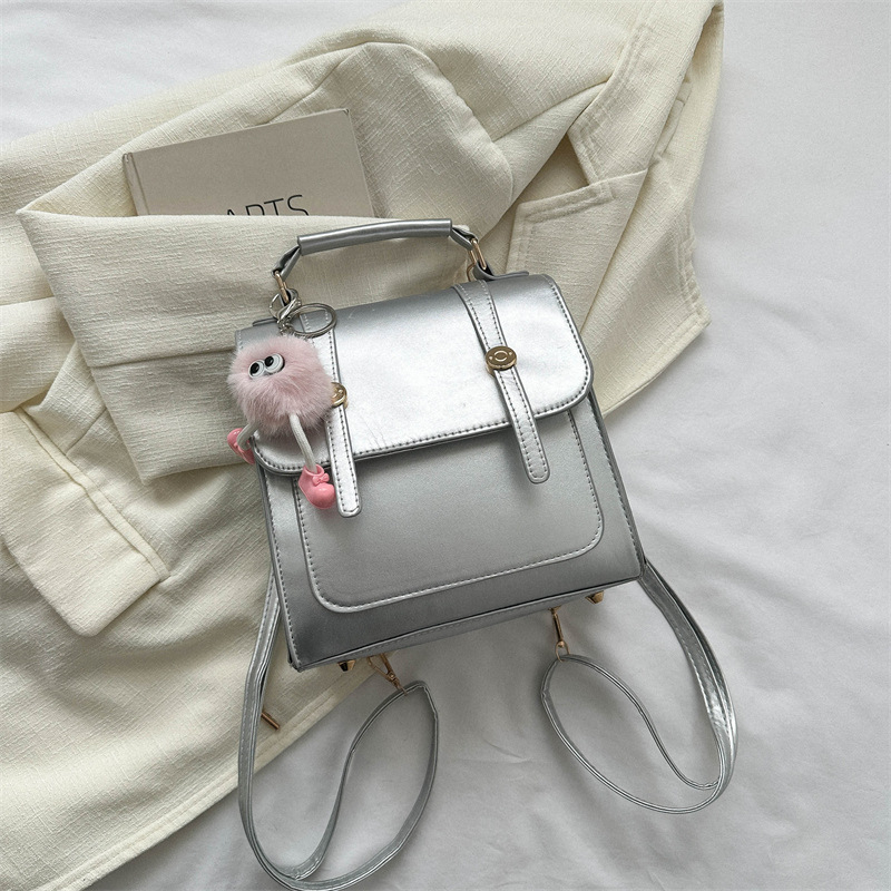 Vienkārša mugursoma sieviešu koledžas stila soma sieviešu soma 2023. gada jauna modes ikdienas plecu rokassoma maza mugursoma