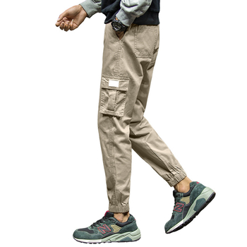 Prekogranične jesenske nove mladenačke plus size muške tanke slim-fit ležerne pamučne hlače s 9 točaka uskog kopčanja tvornica