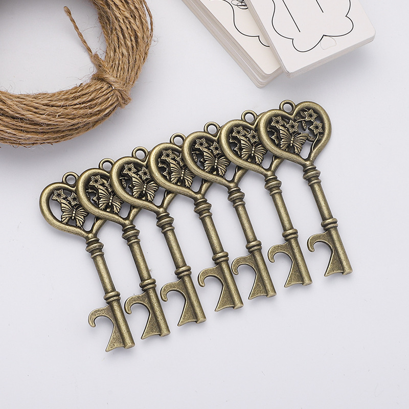 Vestuvių reikmenys, drugelio raktas, butelių atidarytuvas, kūrybingas viešbučio vestuvių dekoravimas, mažas alaus pakabukas, raktų pakabukas