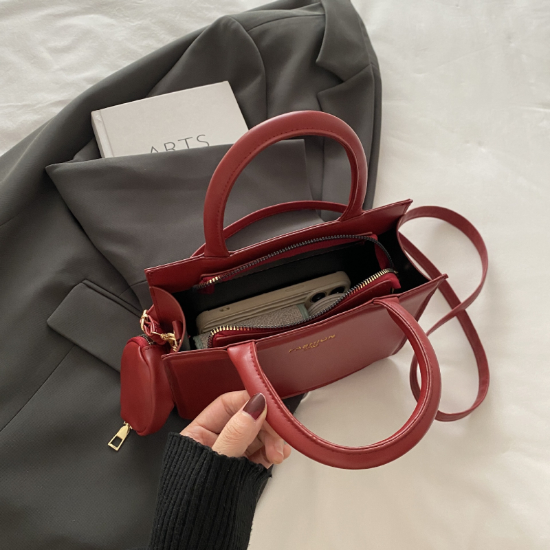 2024. aasta sügis-talv uus moodne naiste lihtne käekott elegantne suure mahutavusega piiriülene õlakott ühevärviline õlakott