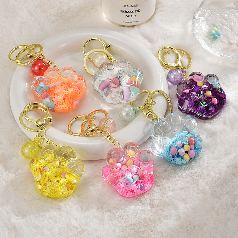 Õli voolava liivapudeli võtmehoidja akrüülist võtmehoidja ripats kingitus armas kassipoeg haarata kiosk väikesed ehted hulgimüük