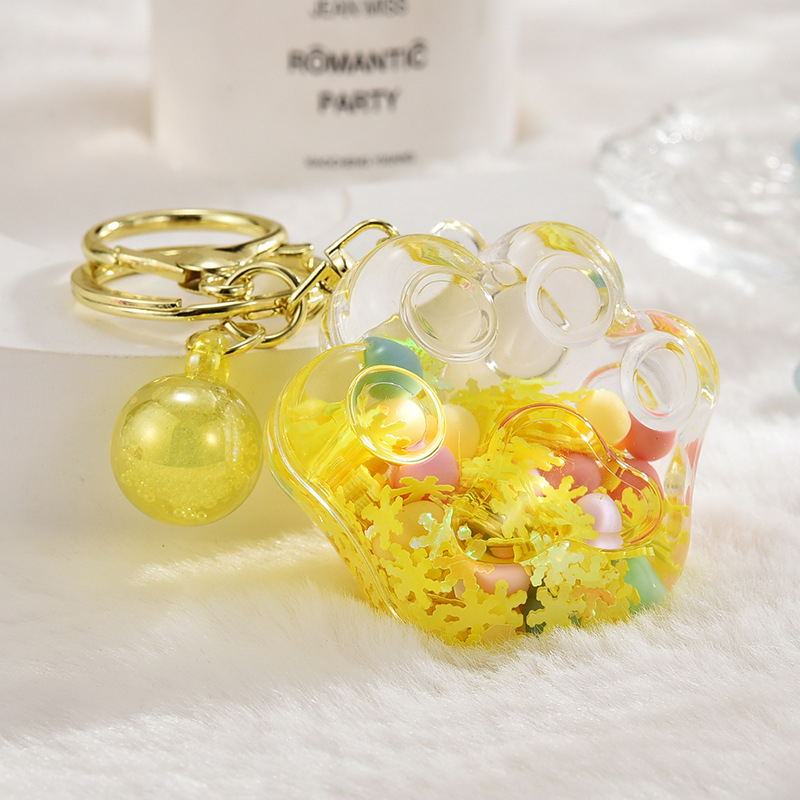 Õli voolava liivapudeli võtmehoidja akrüülist võtmehoidja ripats kingitus armas kassipoeg haarata kiosk väikesed ehted hulgimüük