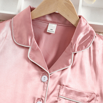 Užsienio prekyba, tarpvalstybinė, vaikiška, vasarinė, trumpomis rankovėmis, vienspalvis kostiumas, imitacinis šilkas, namų drabužiai vidutiniams ir dideliems berniukams bei mergaitėms.