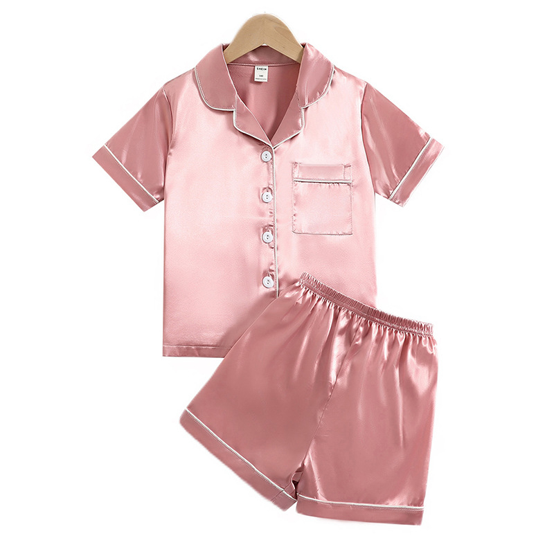 Užsienio prekyba, tarpvalstybinė, vaikiška, vasarinė, trumpomis rankovėmis, vienspalvis kostiumas, imitacinis šilkas, namų drabužiai vidutiniams ir dideliems berniukams bei mergaitėms.