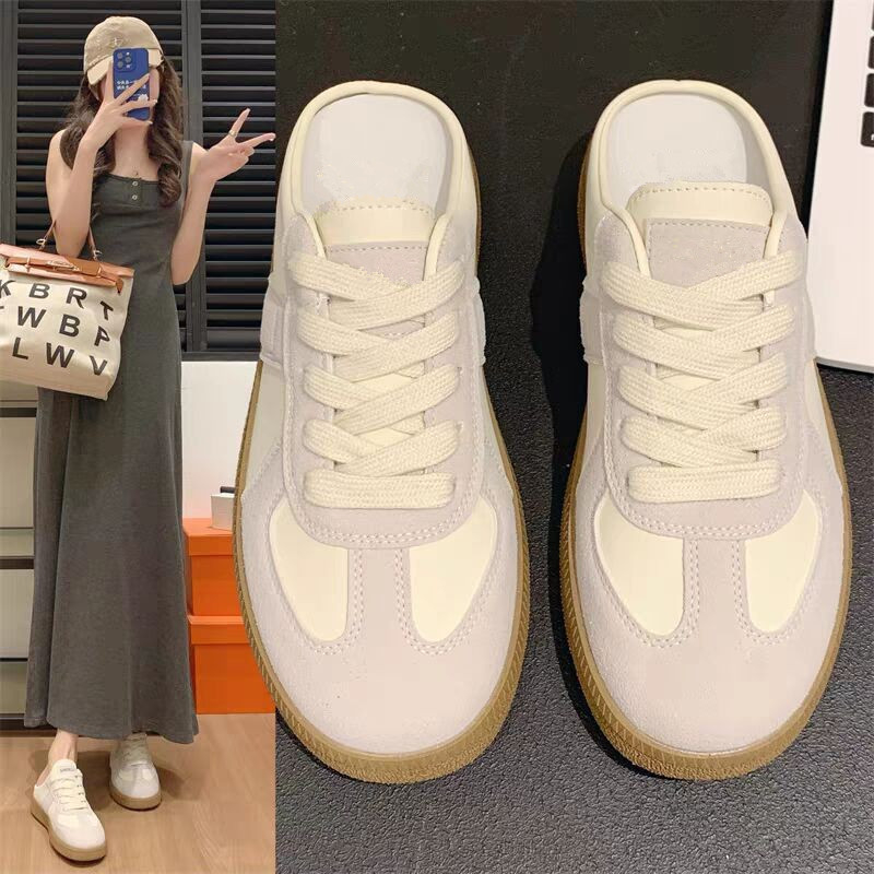 Korejski stil stopala male retro njemačke tenisice za trening 2025. ženske vanjske cipele ljetne nove lijene slip-on Baotou papuče za polovicu, moderne