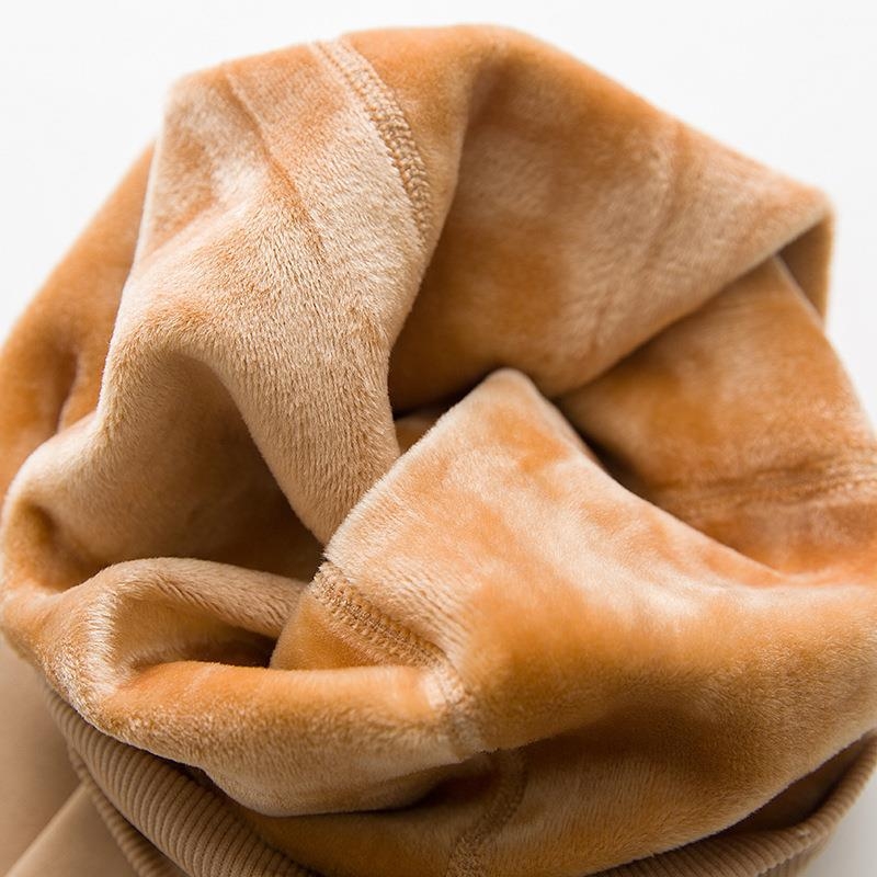 Megztos viršutinio drabužio tamprės su fliso pamušalu, labai elastingos, rudeniui ir žiemai, pastorintos, vientisos, šiltos ir besiūlės „Bare-Kreat Illusion“ stiliaus kelnės.