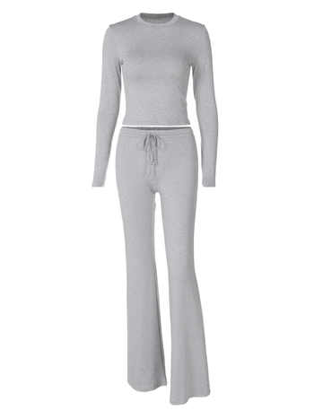 Euroopa ja Ameerika rõivad 2025. aasta sügis- ja talvemood naba paljastavate pikkade varrukatega pluusid, õhukesed paeltega kinnitatavad kellukese allosaga vabaajaülikonnad