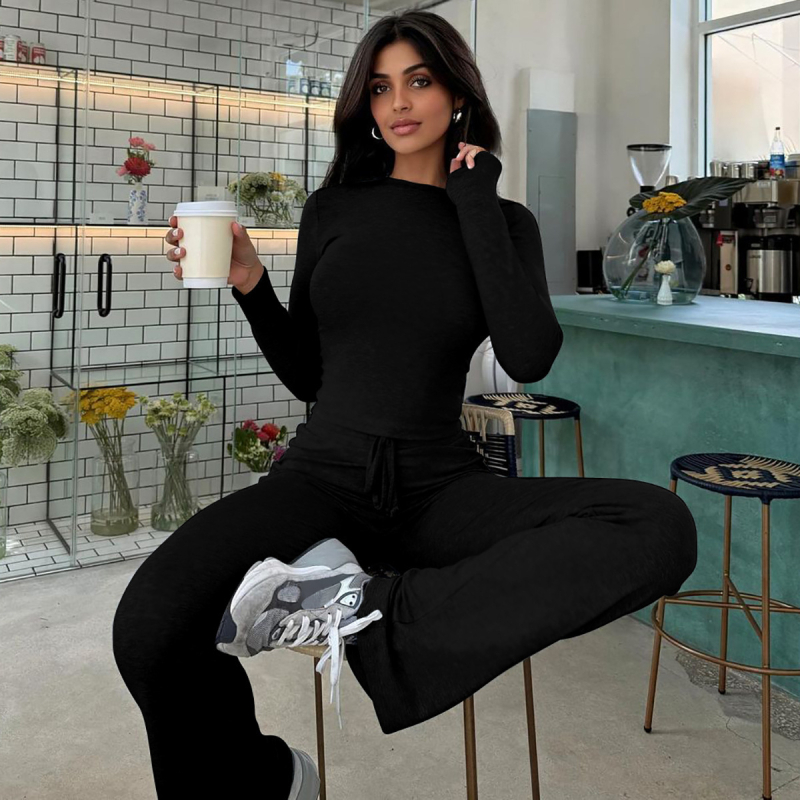 Euroopa ja Ameerika rõivad 2025. aasta sügis- ja talvemood naba paljastavate pikkade varrukatega pluusid, õhukesed paeltega kinnitatavad kellukese allosaga vabaajaülikonnad