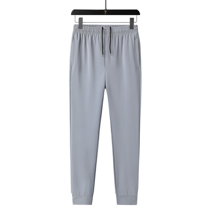 Vabaaja hea ümara kaelusega jakk, kardigan, sügisene pikkade varrukatega top-püksid, sõnadega, kolmeosaline meeste sportlik ülikond laos.