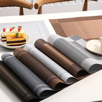 Pārrobežu noliktavā pieejams Teslin Western galda paliktnis, PVC izolēts galda paliktnis, taisnstūrveida, vienkāršs, mājsaimniecības vienreizlietojamais šķīvju paliktnis