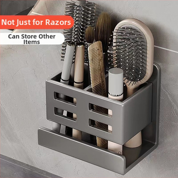 Vonios kambario šukų lentynėlė, tualetas be skylių, prie sienos tvirtinamas tualetas, kosmetinis skustuvas, dantų šepetėlis, dantų pastos laikymo cilindras