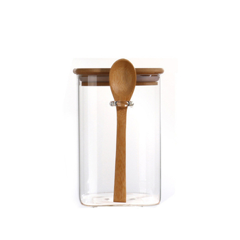 Aukšto borosilikatinio stiklo tiesus cilindras su šaukštu sandariu stiklainiu Buitinis arbatos stiklainis su šaukštu Druskos stiklainis Cukraus stiklainis Paprastas laikymo stiklainis