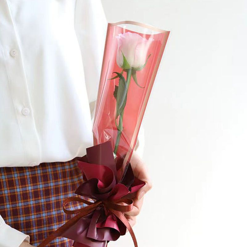 Hulgimüük õpetajapäeva ühe lille pakendikott läbipaistev veekindel kuldse servaga kilekott Hiina valentinipäeva roosikimbu kott