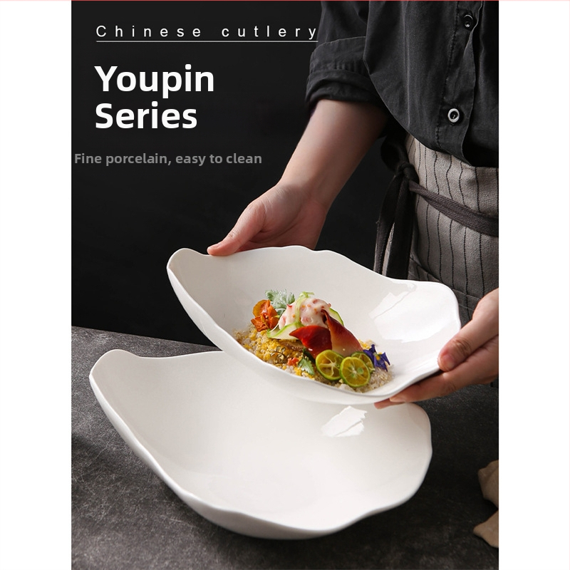 Lihtne ja kõrgekvaliteediline valge kujuga külmade roogade taldrik hotelli restorani isiksuse ebakorrapärane keraamiline pikk kauss restorani lauanõud