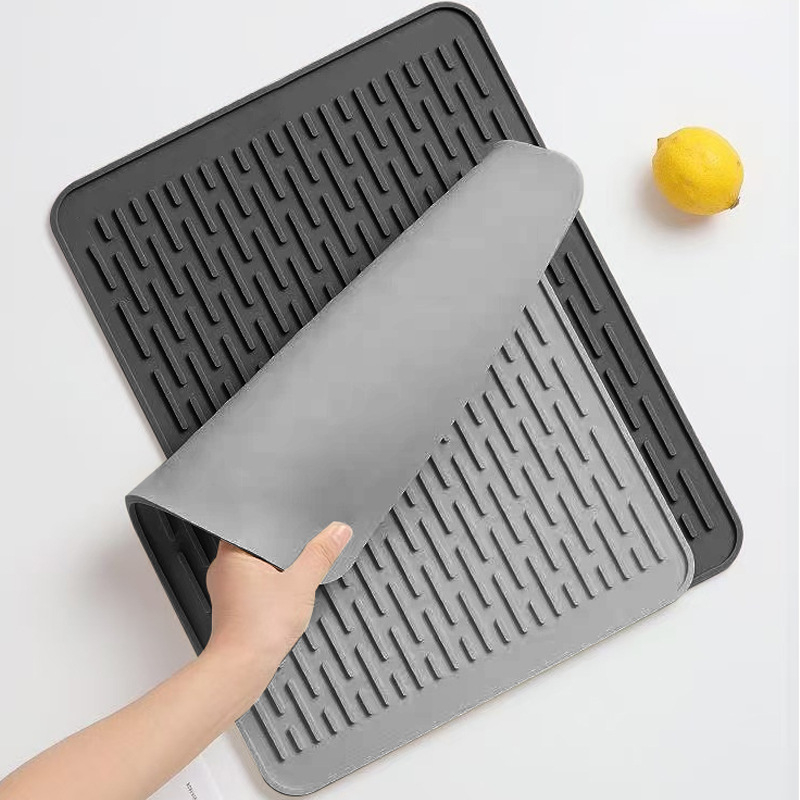 Silikona plīts paklājiņš, notekas paklājiņš, sauss paklājiņš, izolācijas paklājiņš, mikroviļņu krāsns paklājiņš, pārrobežu virtuves karstumizturīgs kafijas paklājiņš, ēdamgalds