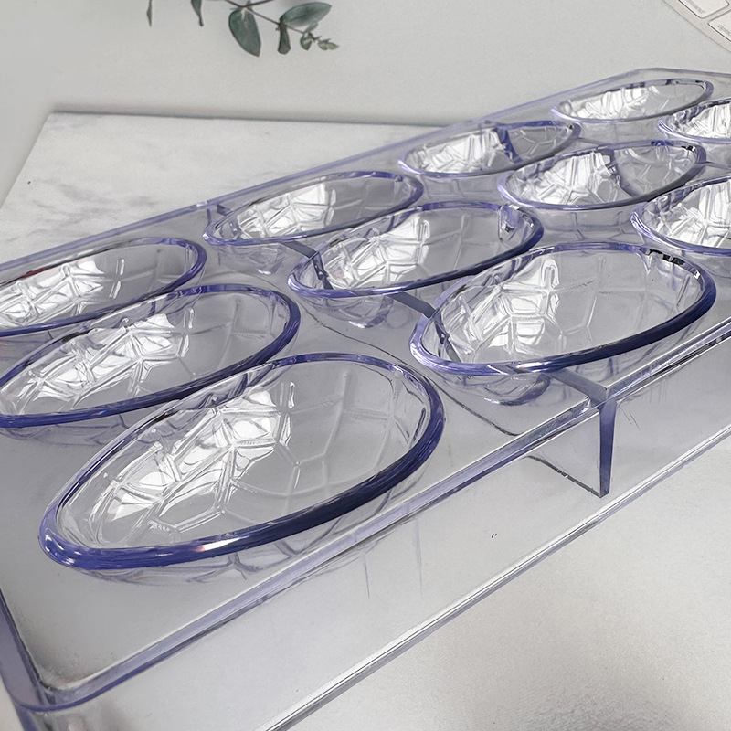 Klassikaline 12-osaline dinosauruse muna šokolaadivorm läbipaistev kõvast plastist värviline muna jäävormi šokolaadi küpsetusvorm