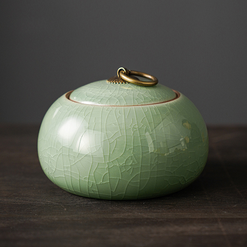 Ge kemence teaüveg lezárt üveg kerámia kis hordozható celadon tea Pu'er tárolóedény háztartási nagykereskedelem