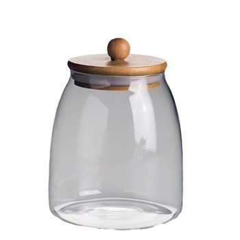 Skaidrus stiklinis arbatos indelis, kvapnus arbatos indelis, juodos arbatos buteliukas, apvalus bambukinis dangtelis su sandarinimo žiedu, prieskonių laikymo indelis