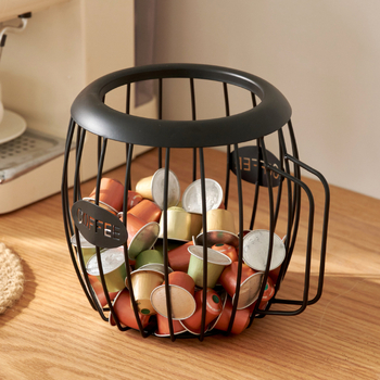 Piiriülene loominguline puuviljakorv sepistatud rauast kohvikapslite hoidmiseks sinised suupisted kuivatatud puuviljad puuviljade hoidmiseks kaldus korv