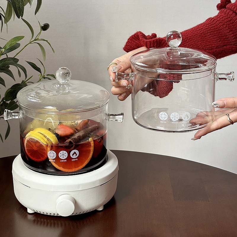 Läbipaistev kuuma punase veini kann, pliidil keetmise teekann, kõrge temperatuurikindel hautisepott, puuviljalõhnaline tee, lahtise leegiga elektriline keraamiline pliit, klaasist keedupott