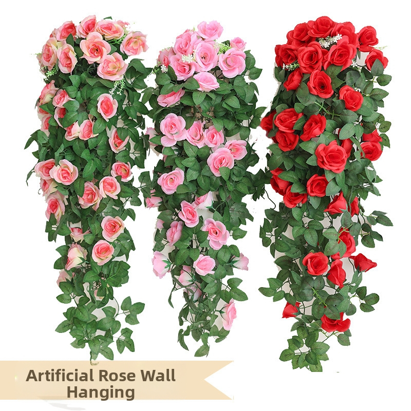 Simulatsioon roosist rotangist seinale riputatav kunstlille rotangist elutoa seinakaunistus roheline taim lagi siseruumides torust seinale riputatav lillekunst