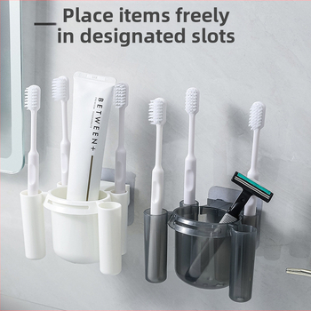 Pramušamas aukščiausios klasės tualeto dantų pastos, dantų šepetėlių laikymo stovas vonios kambario plovimo stalui, organizuojančiam artefaktų kostiumą, dantų pastos stovas