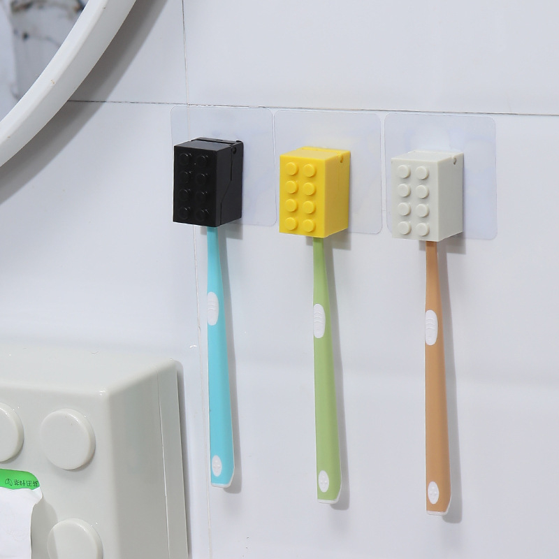 Statybiniai blokeliai, dantų šepetėlių laikymo lentynėlė, prie sienos tvirtinama, dulkėms atspari elektrinių dantų šepetėlių laikymo lentynėlė, be perforatorių, tualeto sieninė lentynėlė