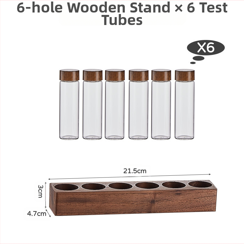 Kohvioad pakend katseklaas klaasist pähklipuust vitriin ühe toruga hoiustamiskoha kohvikomplekt suletud purgi lõhnapudel