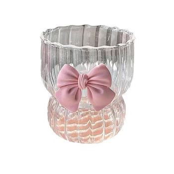 Υψηλής χρωματικής αξίας οικιακό κορίτσι τσάι φρούτων λεμονιού ποτήρι νερό φιόγκο γυάλινο ποτήρι πριγκίπισσα άνεμος βούρτσα γαργάρων