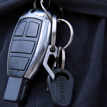 Titaanisulamist minipudeliavaja kruvikeeraja roostevabast terasest EDC vidin õllekruvikeeraja tööriist võtmehoidja