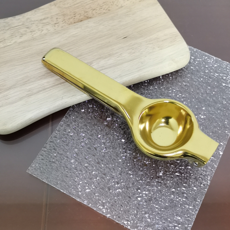 Kodumajapidamises kasutatav roostevabast terasest käsitsi pressitav sidrunimahlapress, köögis kasutatav kuldne roostevabast terasest puuviljamahlapress