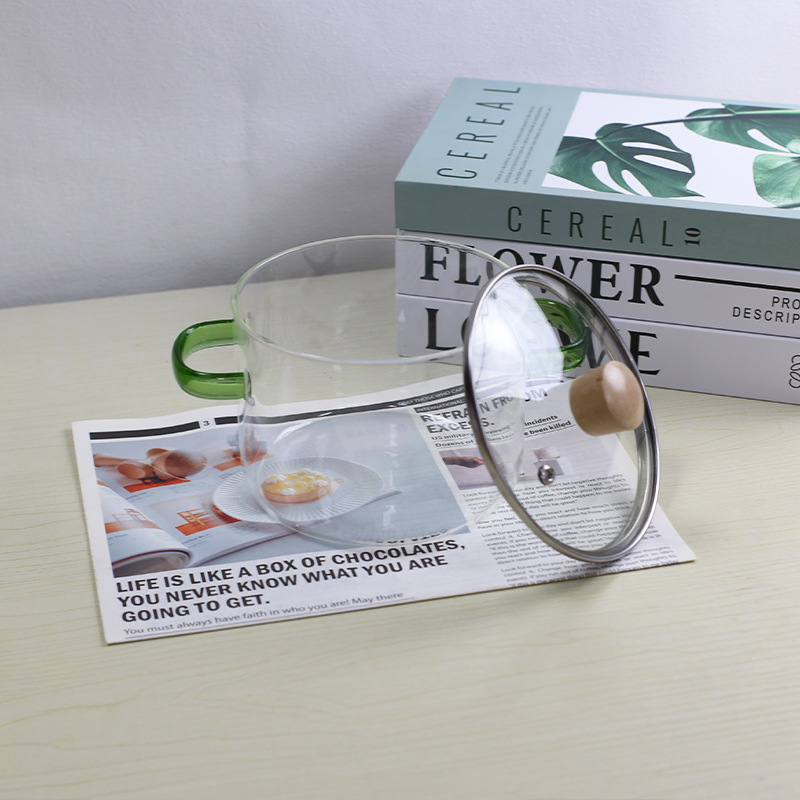 Nagy kapacitású konyhai kellékek leveses üvegfazék kicsi fogantyúval zöld fogantyú üvegfazék magas hőmérsékletnek ellenálló nyílt láng univerzális