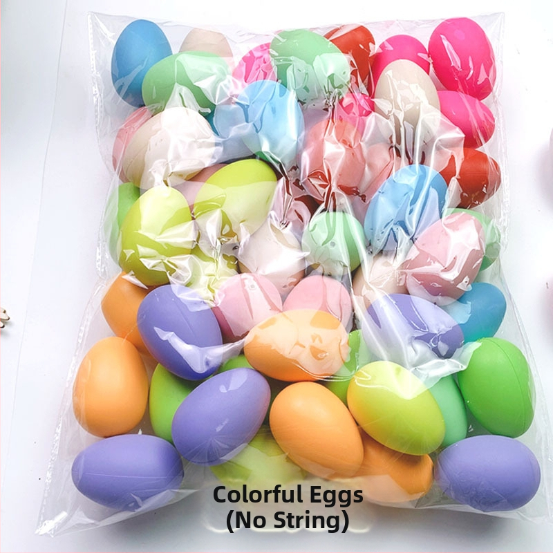 50 tükki valgeid värvilisi kunstmune, plastmassist munakoored, lasteaia käsitööna valminud graffiti lihavõttemunad